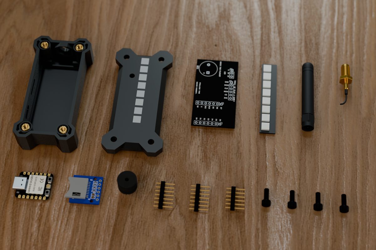 Every part of the kit laid out on a table: case, lid, carrier board, LED stick, antenna, pigtail, XIAO ESP32-C5, SD module, buzzer, pin headers and screws
